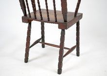 Early 19th Century English Elm Folk Art Comb Back Windsor Chair.