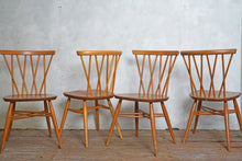 Pair Of Candle Stick Ercol Model 376 Chairs