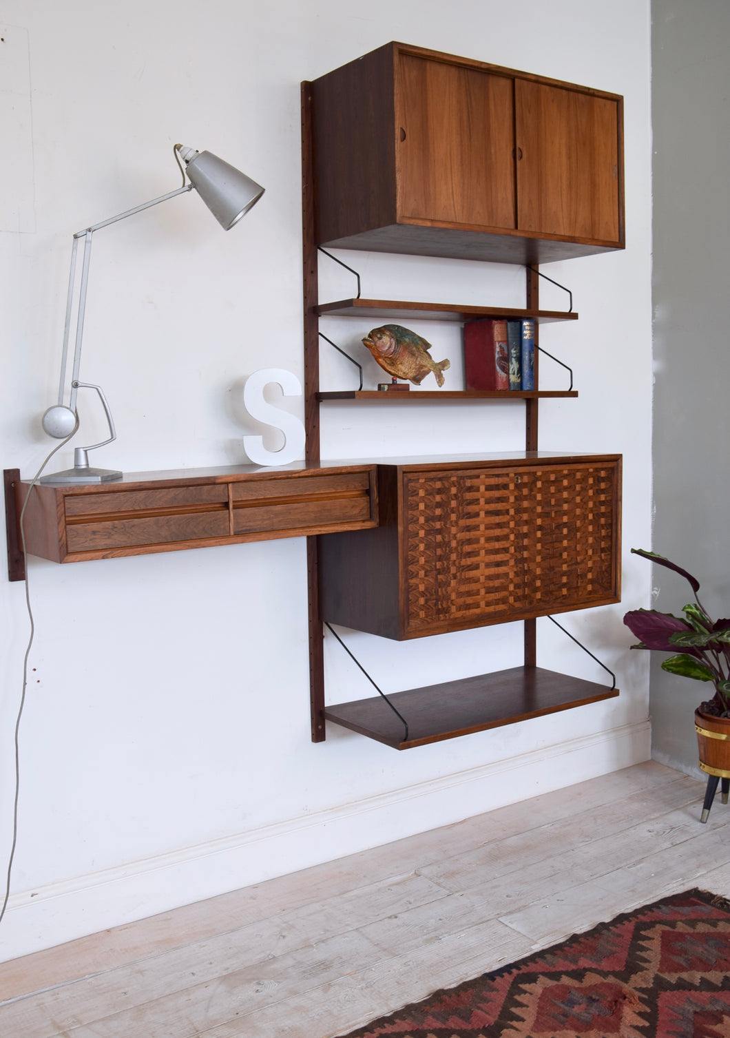 Danish Rosewood Wall Shelving System By Poul Cadovius