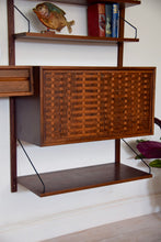Danish Rosewood Wall Shelving System By Poul Cadovius